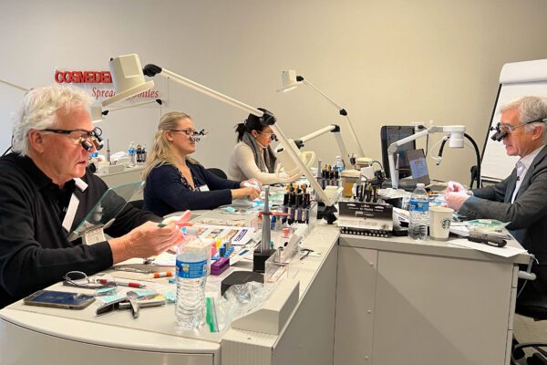 Dr. Corky Willhite guides students through a hands-on composite resin exercise in his ultimate esthetics anterior composite course at the Center for Esthetic Excellence in Chicago.