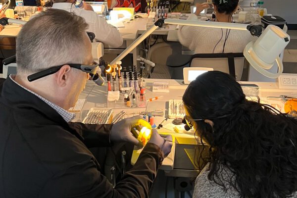 Dr. Arthur Volker works with a CE student on their composite restoration skills at the Center for Esthetic Excellence in Chicago.